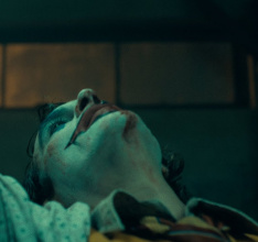 The Joker Has A Bloody Poster & A Maniacal Trailer